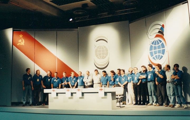 Photo of most of the audio visual engineers for the G8 Press Briefings 1991, London - on the stage where moments before, world leaders including Gorbachev, had held a press conference