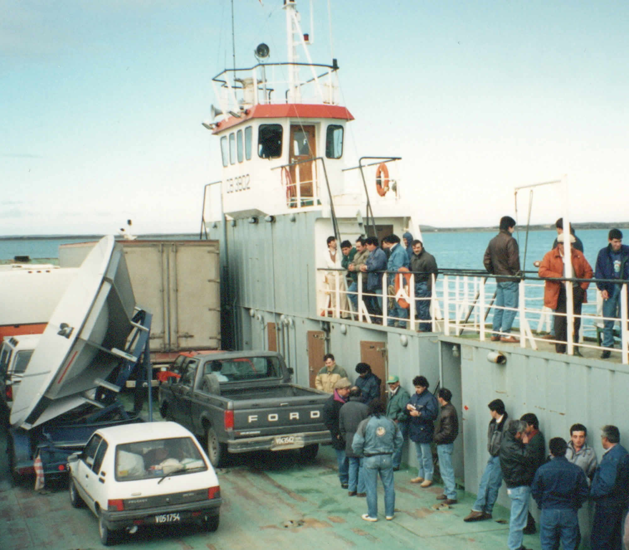 Photo of pickup truck, passengers, and satellote dish on the ferry from Punta Delgada to Bahía Azul