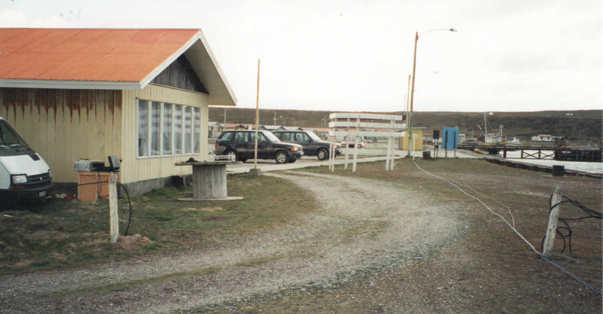 Wider photo of satphone, cafe and 110 yards (100m) of audio and video cable to jetty