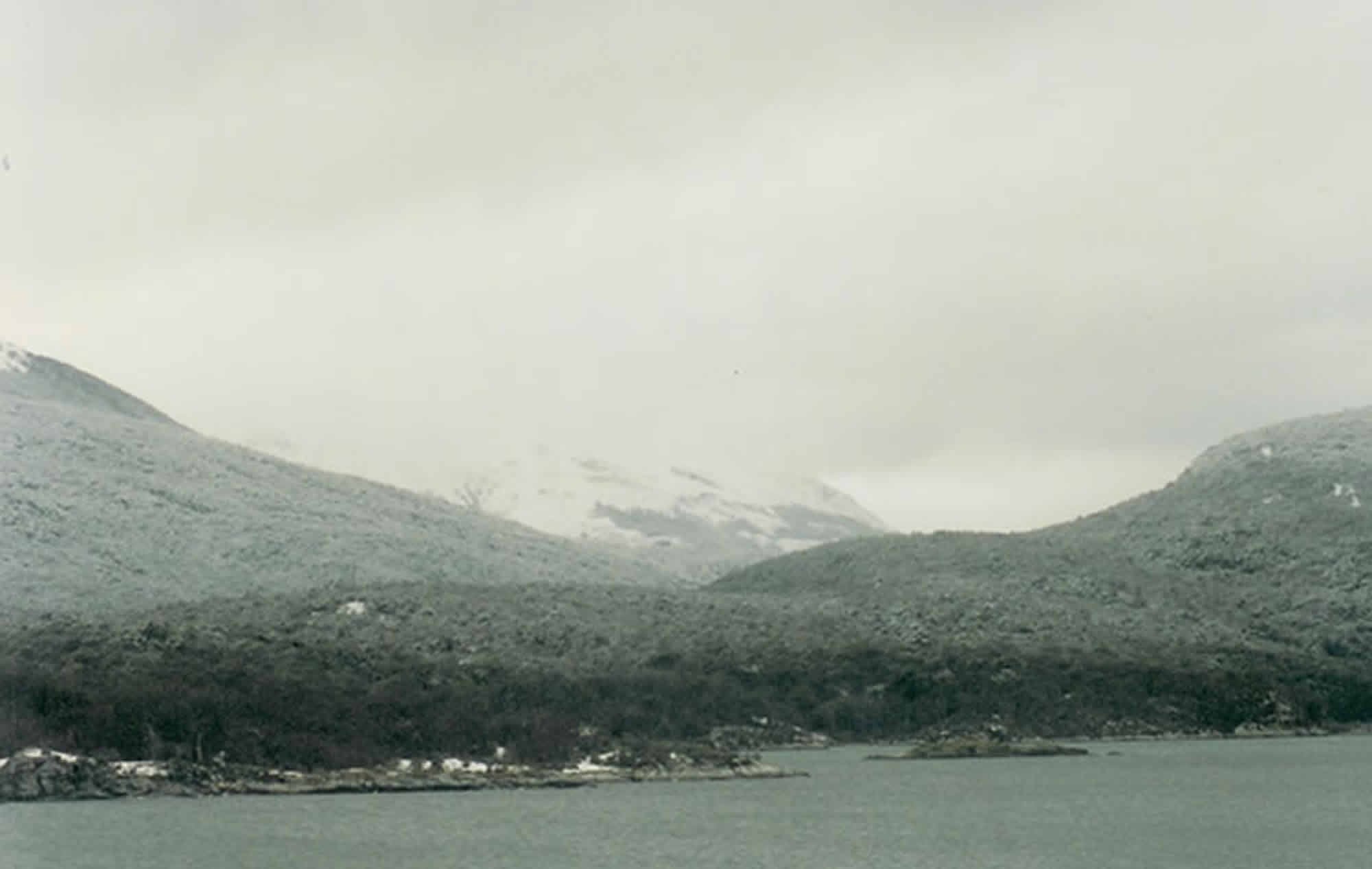 Photo of Lapataia Bay and mountain with the snow and fog off the mountain blocking our satellite uplink signal